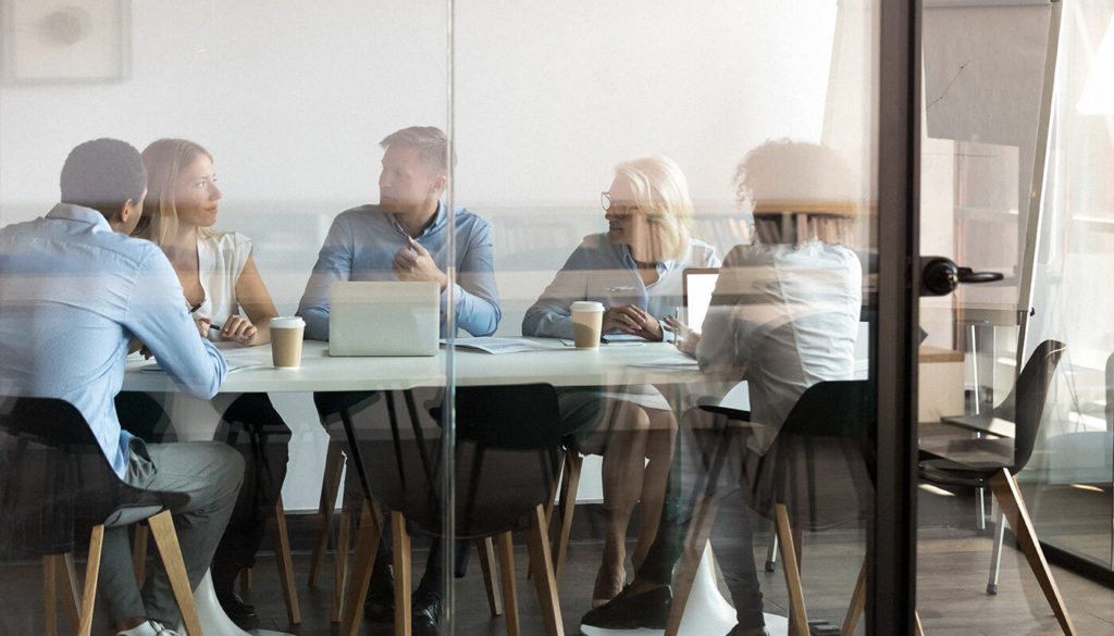 Employees in a meeting room