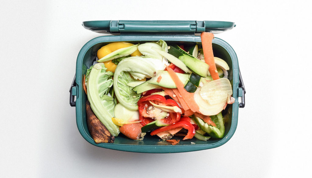 Food waste caddy full of food scraps