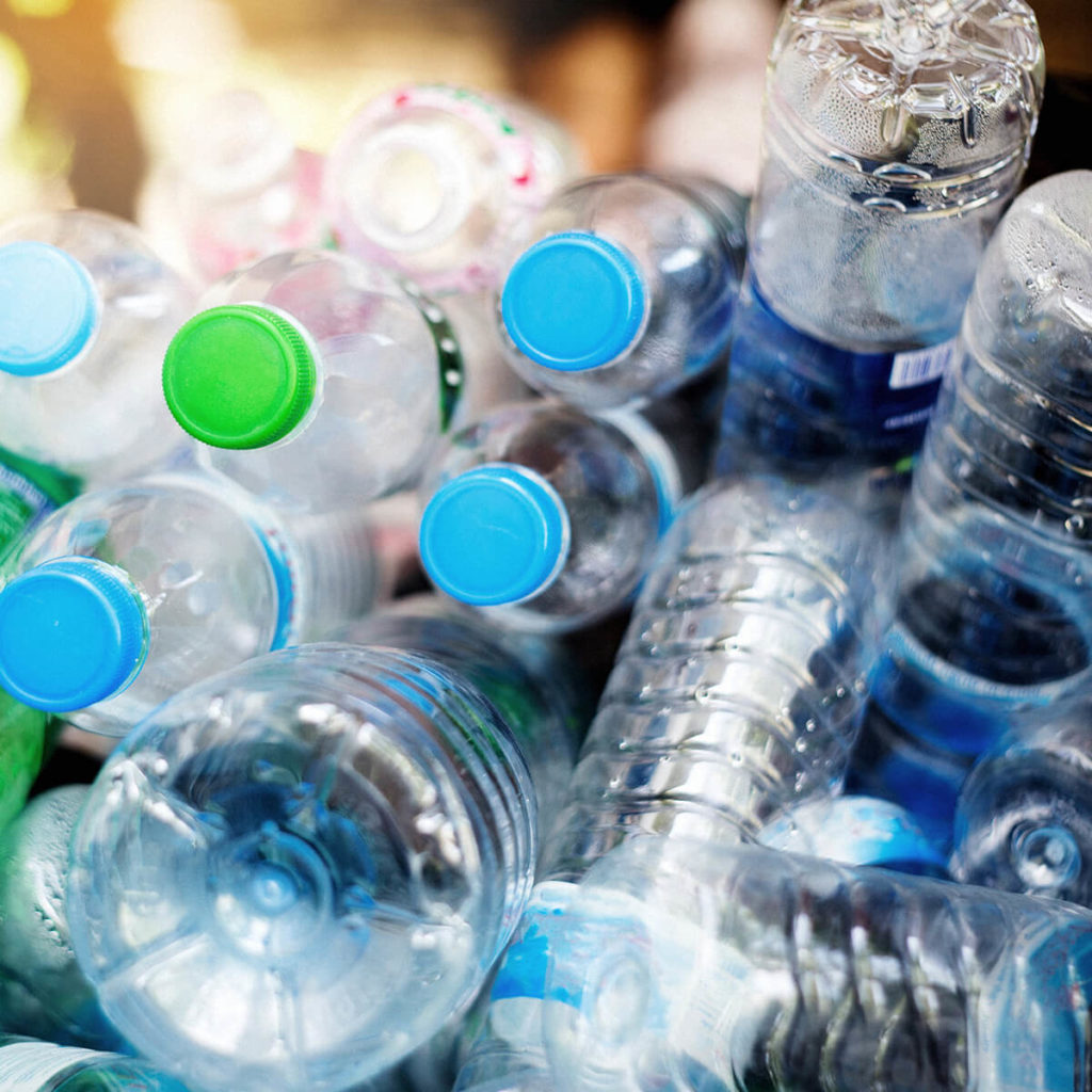 Pile of clear plastic bottles