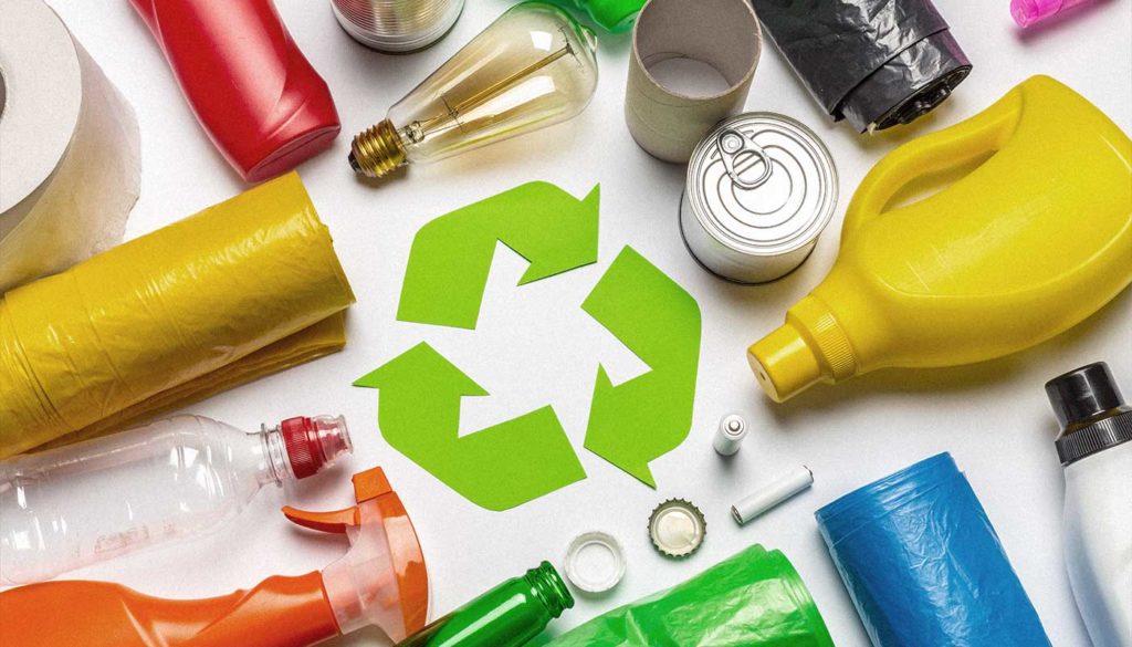 Recycling symbol with recyclable items