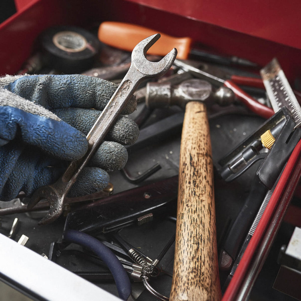 Person borrowing a spanner