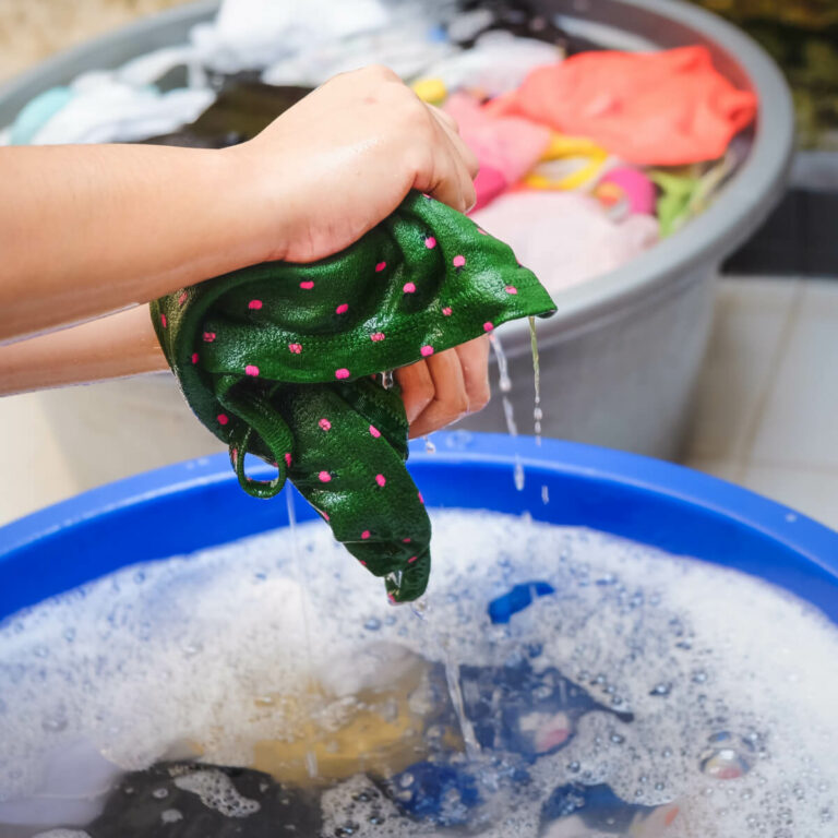 Person hand washing active wear
